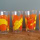 Verres vintage décorated with orange and yellow lemon fruits, Italy.