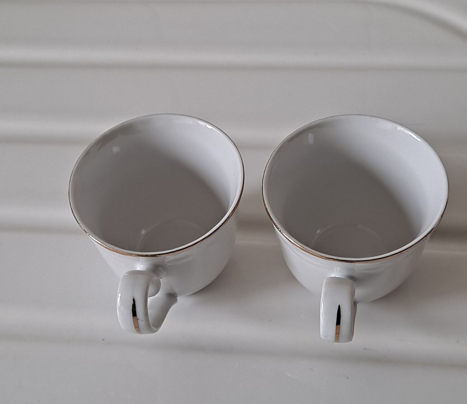 Pair of cups in white porcelain