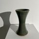 Dark green handcrafted vase with glazed ceramic grass blades