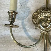 Pair of Two-Arm Bronze Wall Lights with Arrow and Mask Decoration