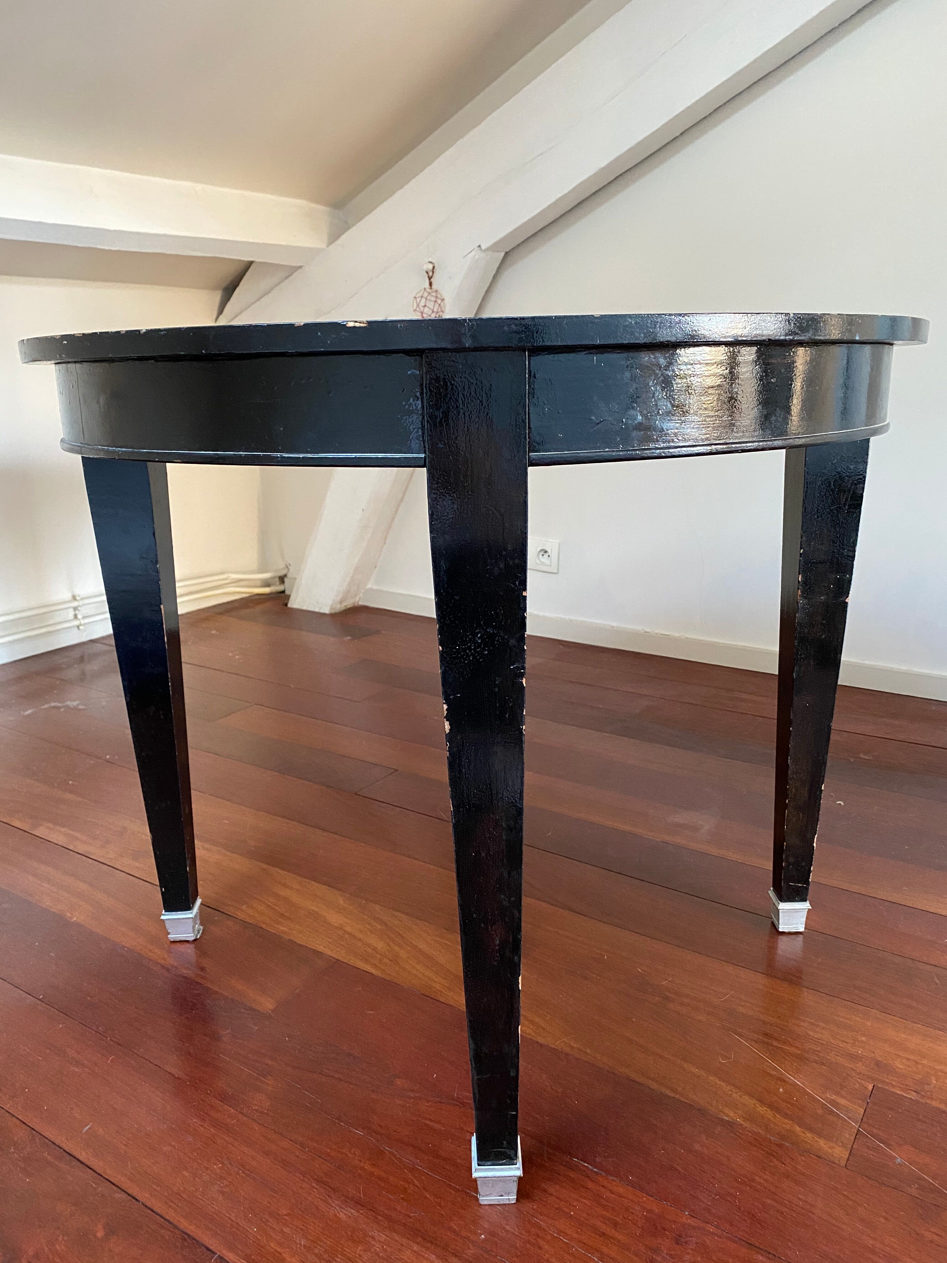 Mahogany round table painted black