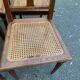 4 Art Deco solid oak cane chairs, circa 1950, with round legs