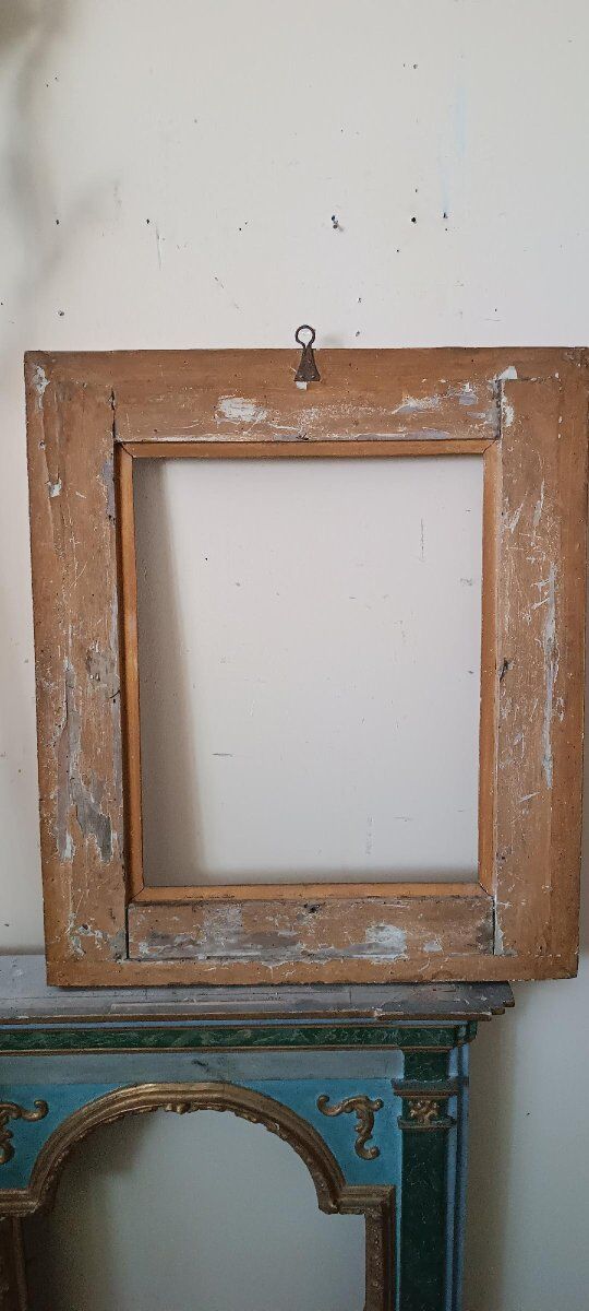 Miroir ancien en bois doré