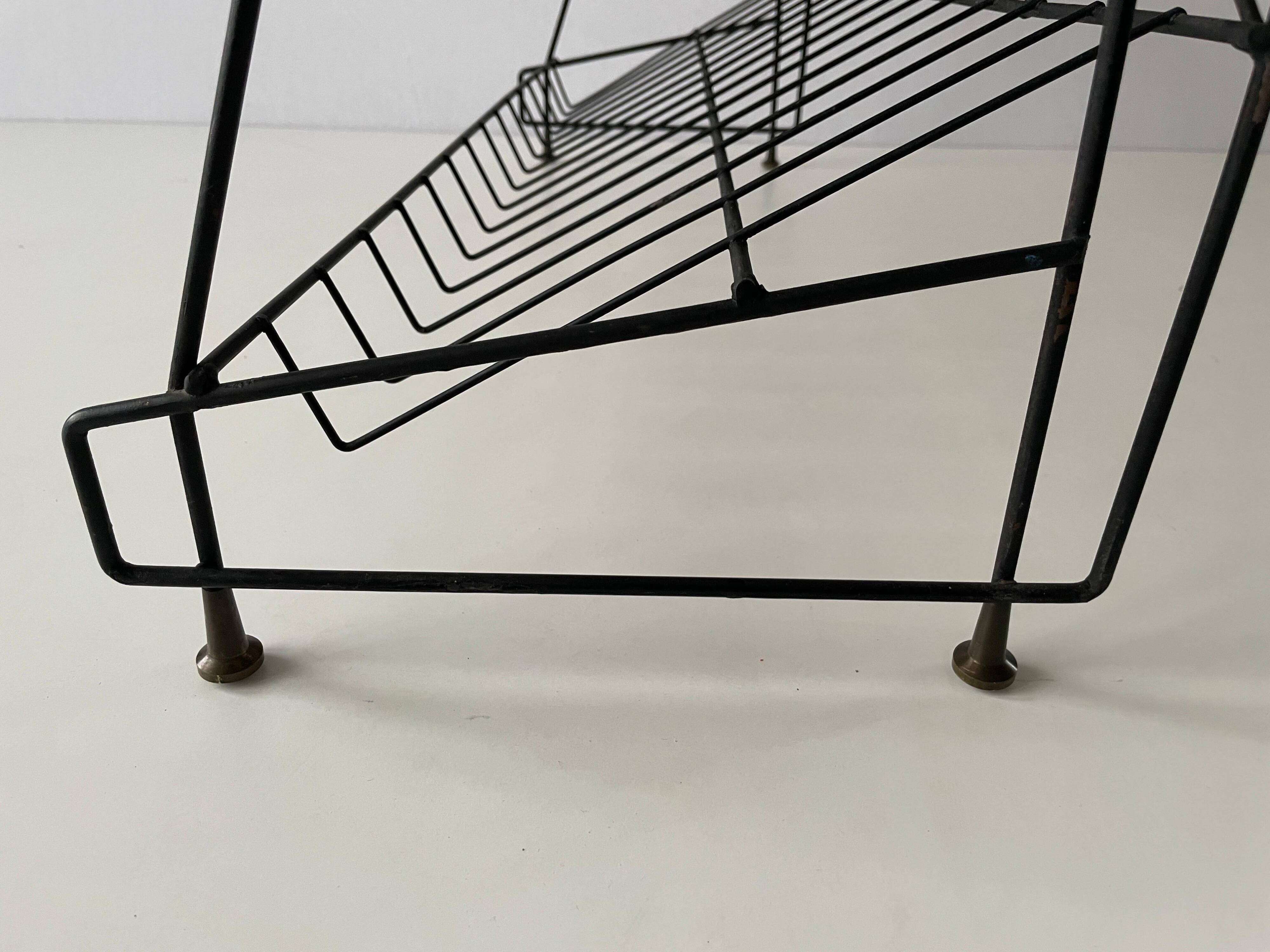 Free-standing shelf with a metal structure and 3 shelves, 1960s, Italy.