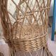 Table and two wicker chairs for children.