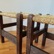 Pair of handcrafted stools from Friuli in carved wood, Italy, circa 1960.