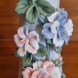 Porcelain vase with flowers in relief