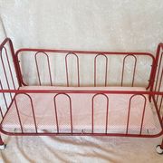 Vintage doll bed large model in red lacquered metal and matching mattress