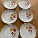 6 small porcelain plates and vintage orange and yellow flowers