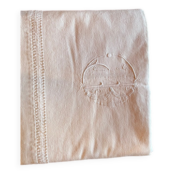 Old embroidered monogram sheet