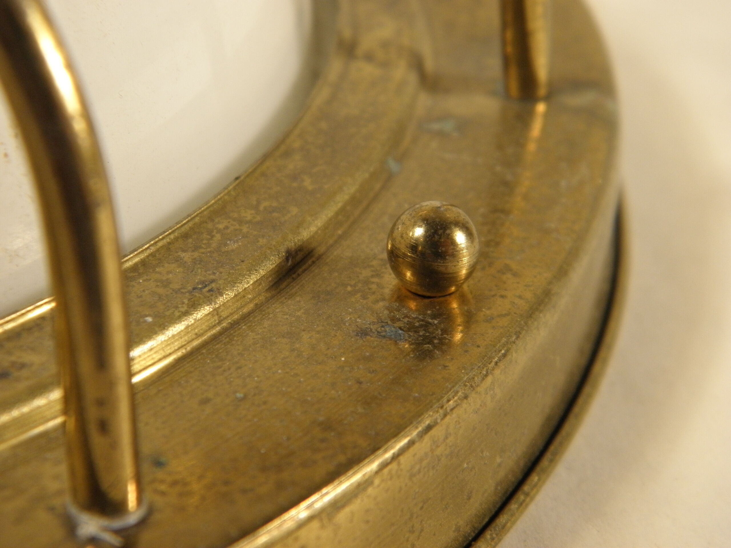 Brass "porthole" wall lamp