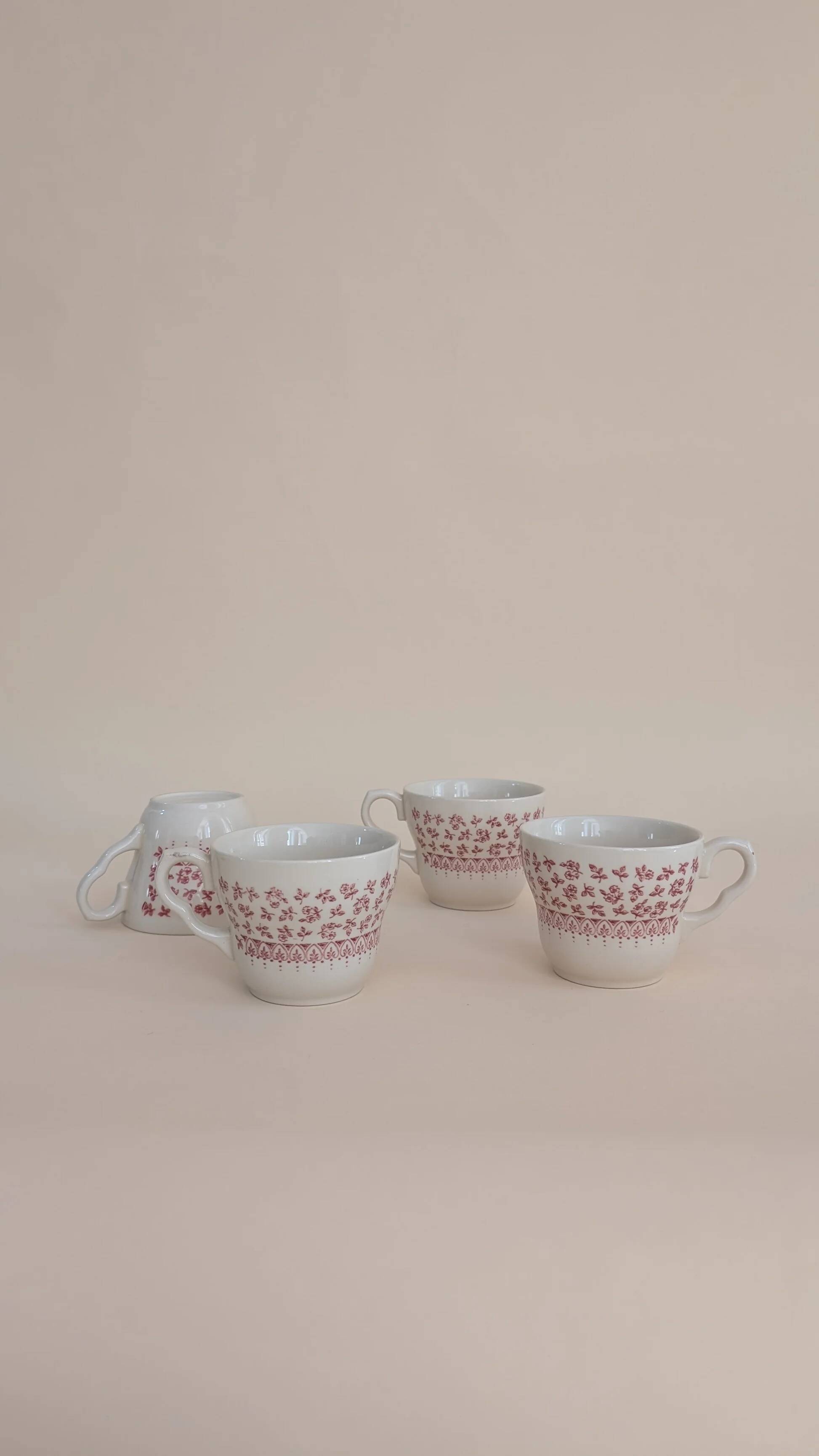 Set of 4 red ceramic mugs