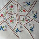 12 embroidered tea towels