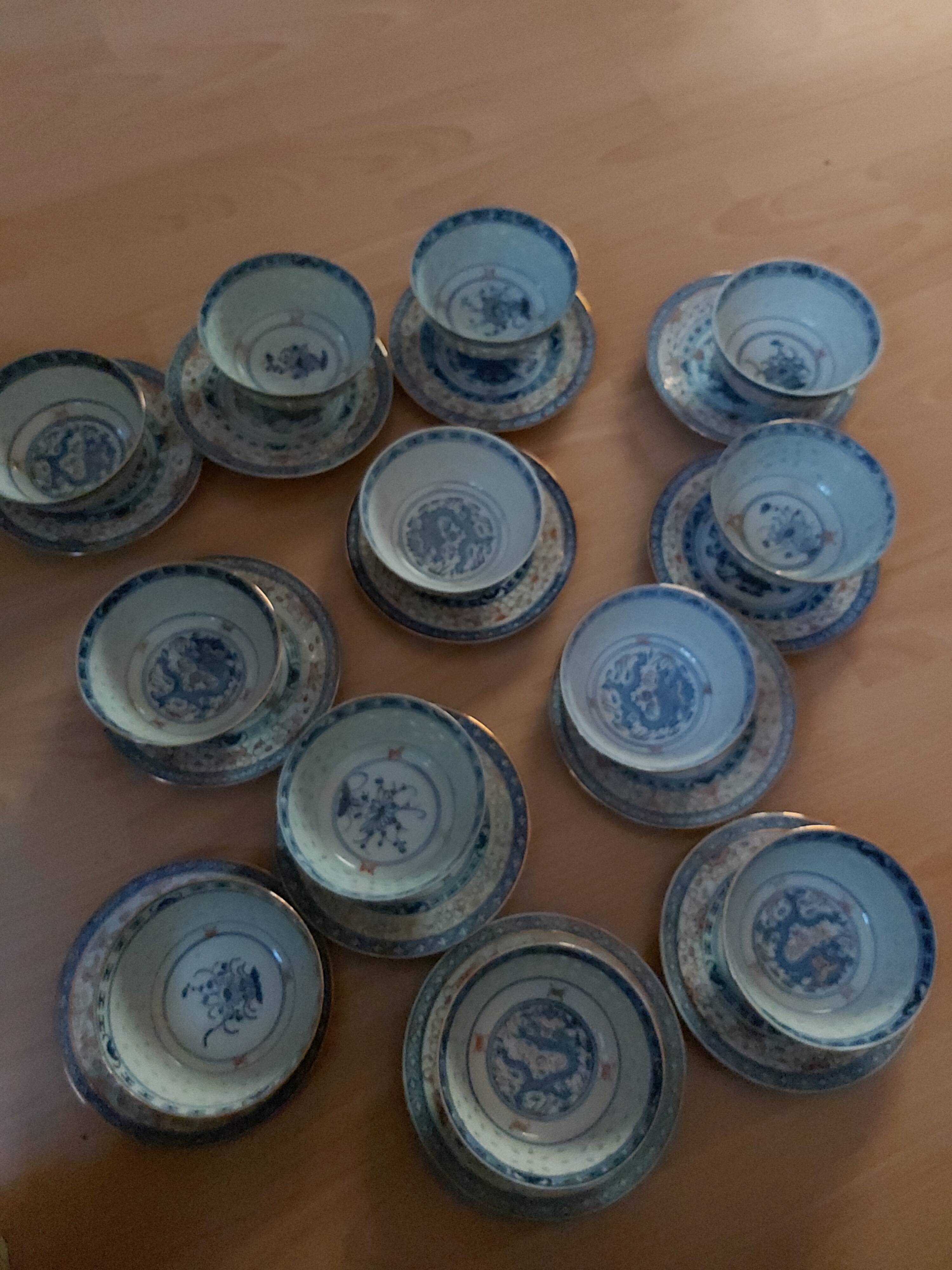 Service of 12 bowls and 12 under dishes in Chinese porcelain called rice seed of the 1960s