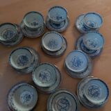 Service of 12 bowls and 12 under dishes in Chinese porcelain called rice seed of the 1960s