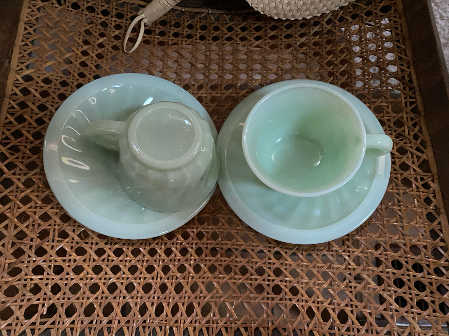 A pair of antique opaline coffee cups.