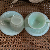 A pair of antique opaline coffee cups.