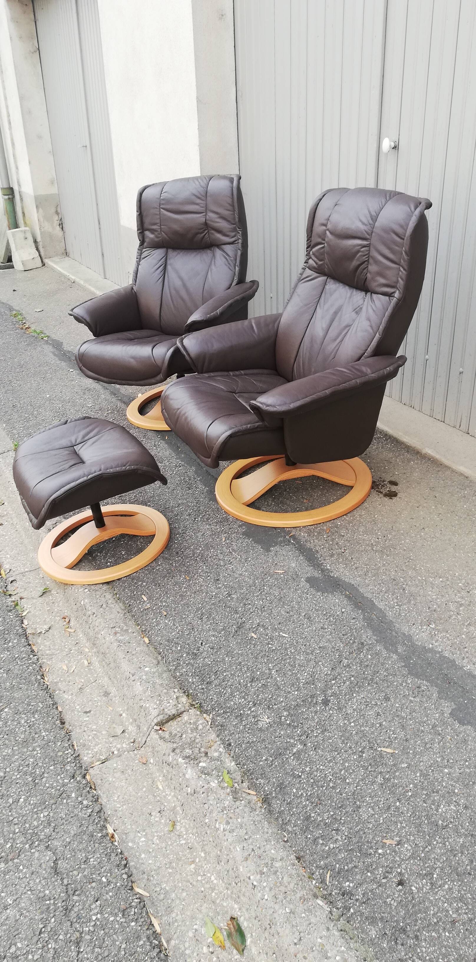 Pair of vintage armchairs with ottoman
