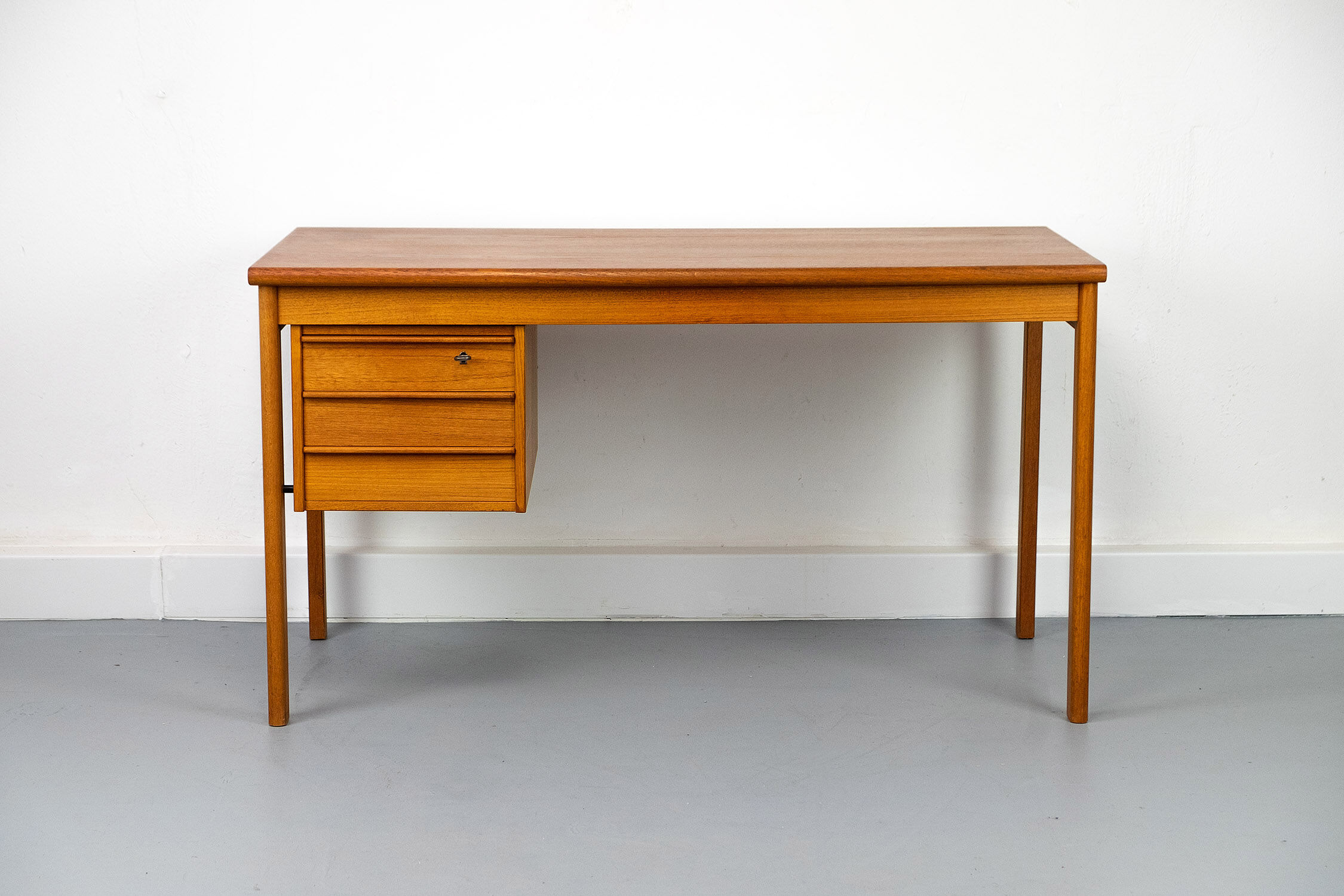 Teak Desk with movable table top by Løvig, 1960s