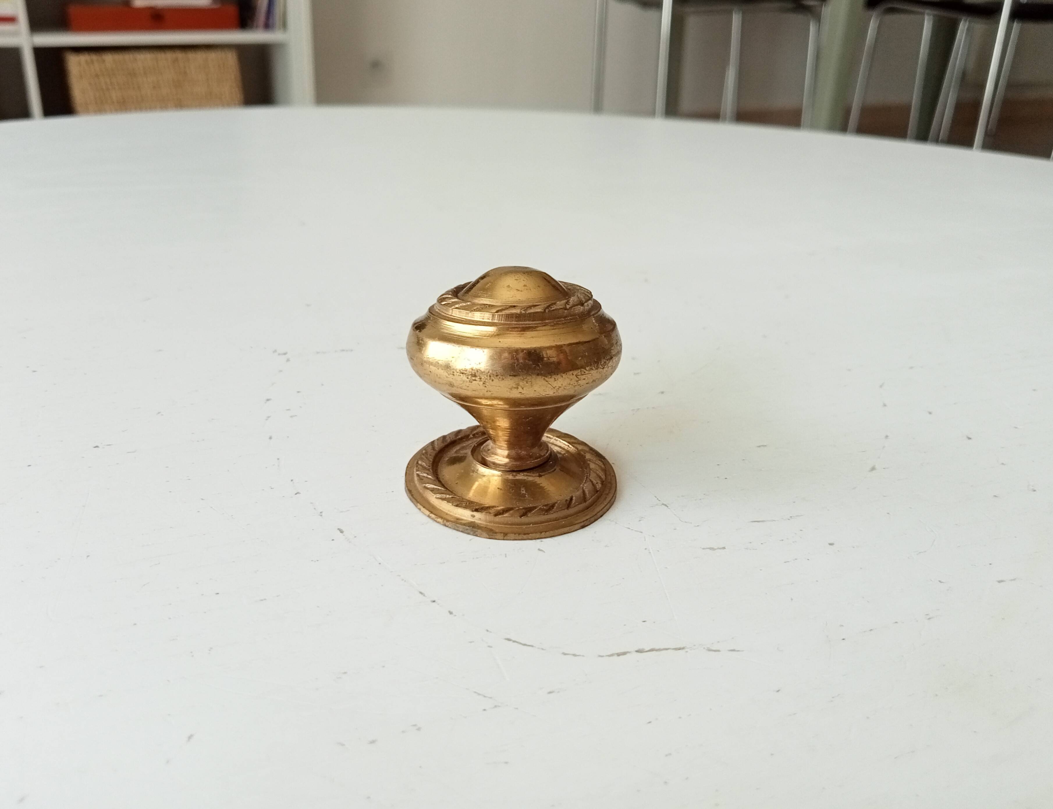 Vintage furniture knob in gilded brass