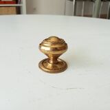 Vintage furniture knob in gilded brass