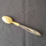 silver-plated baby feeding spoon