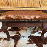 Vintage wooden and goatskin pouf