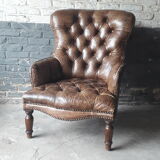 Antique Chesterfield armchair.