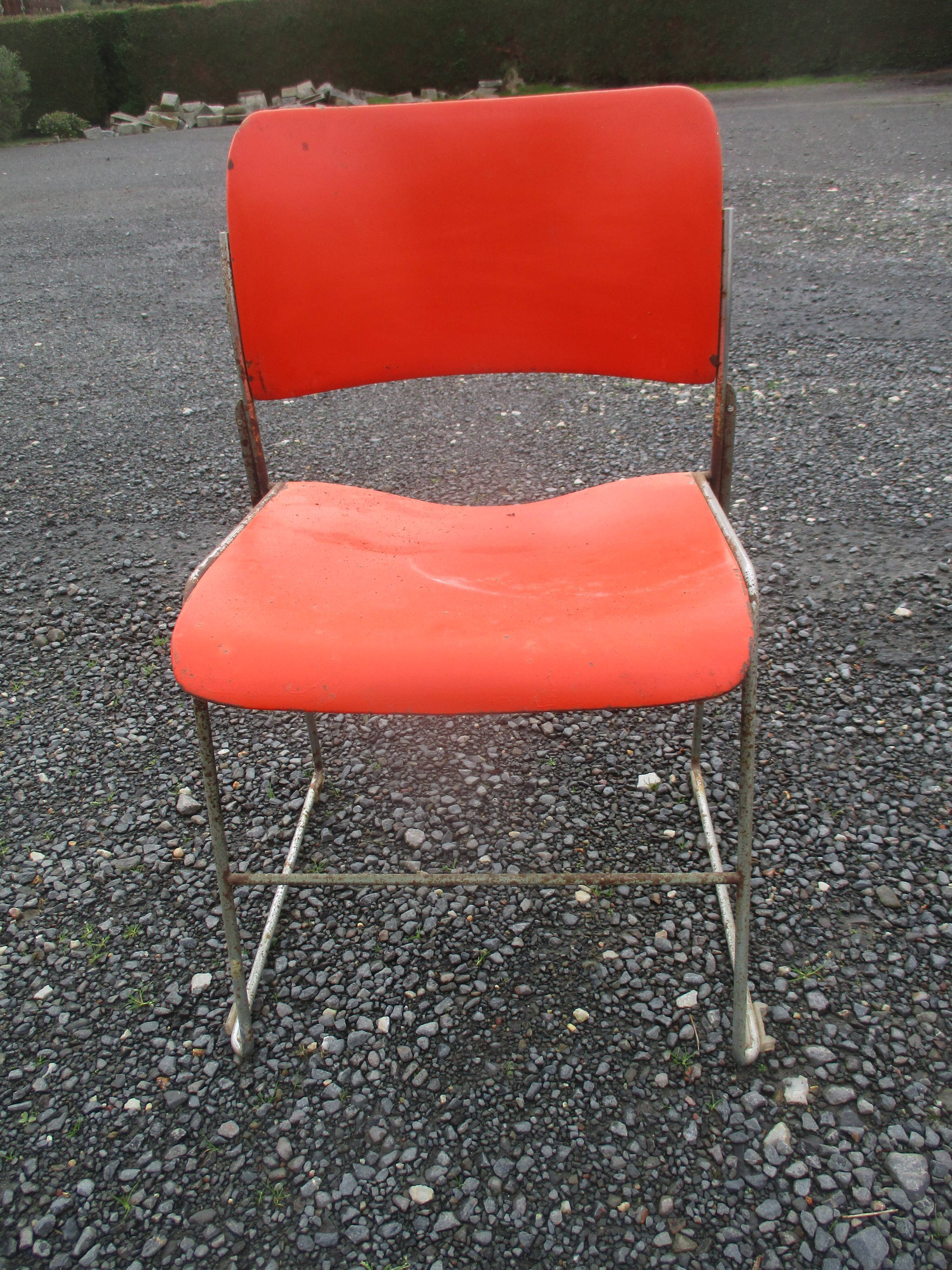 3 iron and plastic chairs