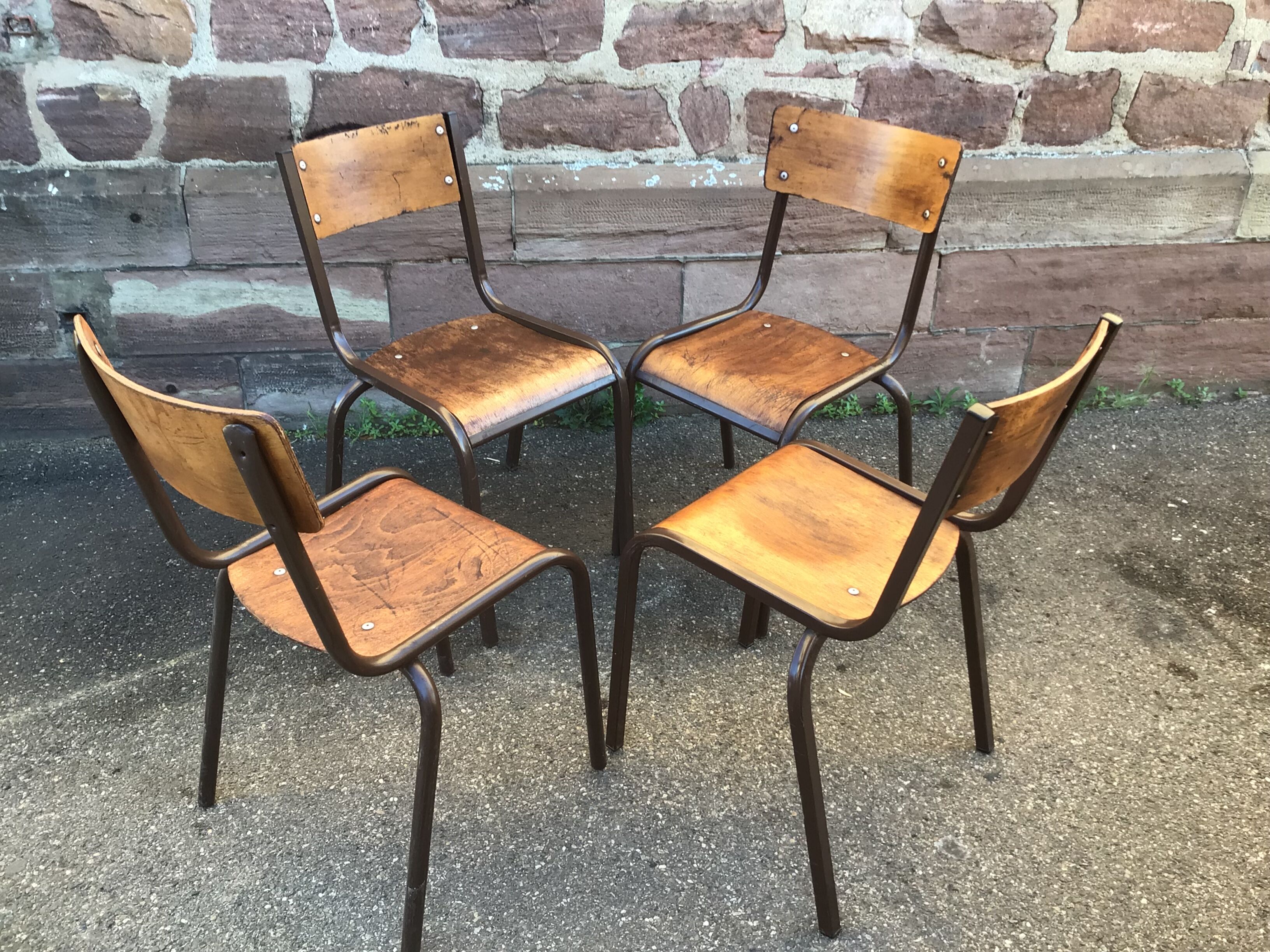 Set of 4 mismatched chairs vintage school mullca communities