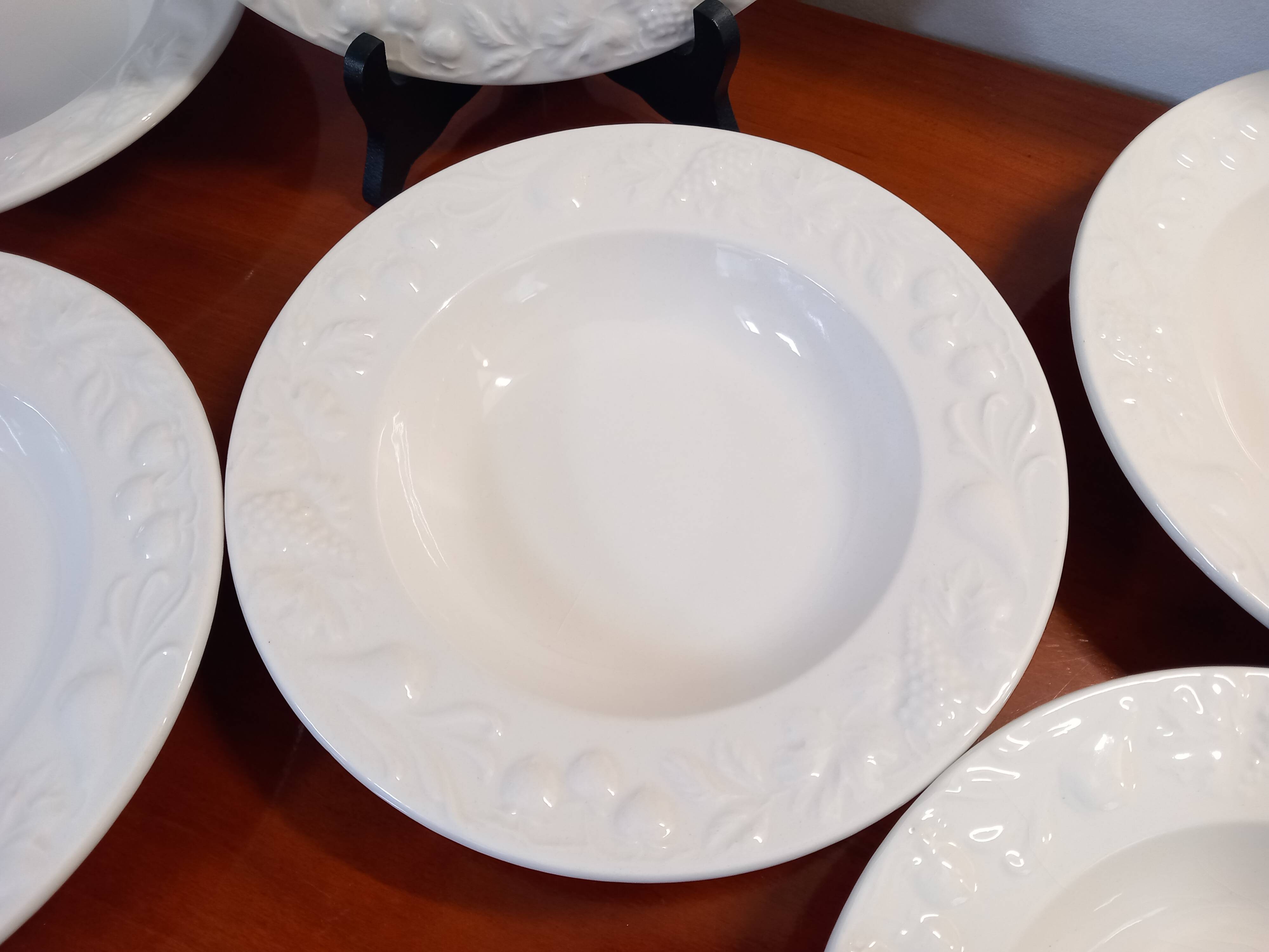 Set of 6 white ceramic deep plates made in Italy.
