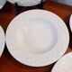 Set of 6 white ceramic deep plates made in Italy.