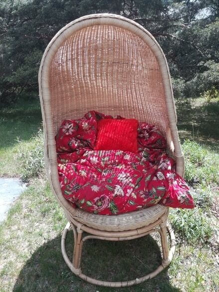 Cocoon armchair in rattan