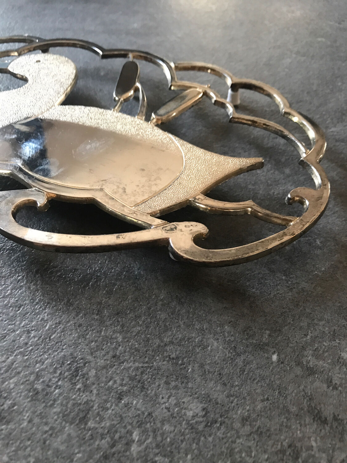 Silver metal duck trivet