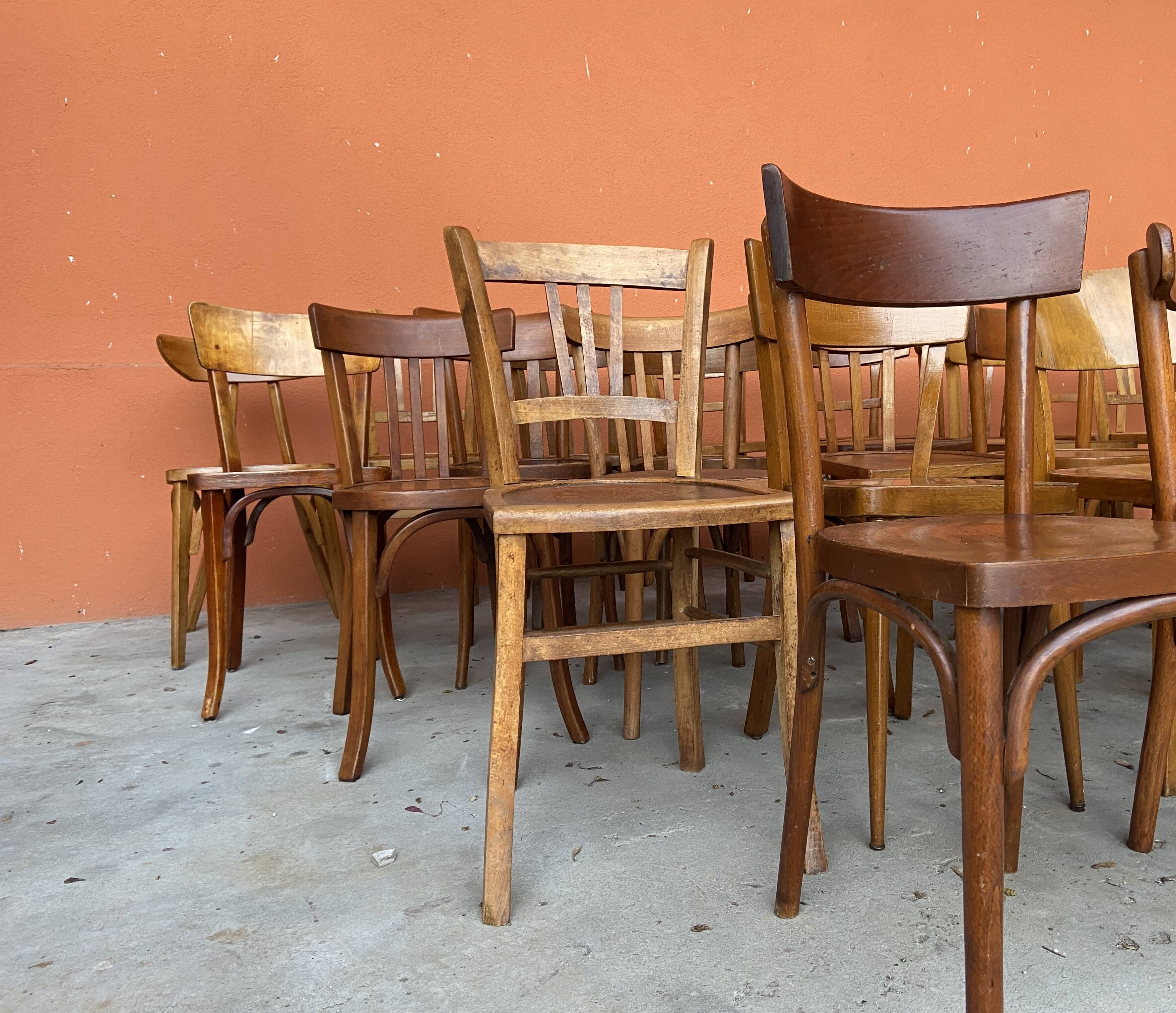 Set of 30 mismatched bistro chairs French Restaurant curved wood