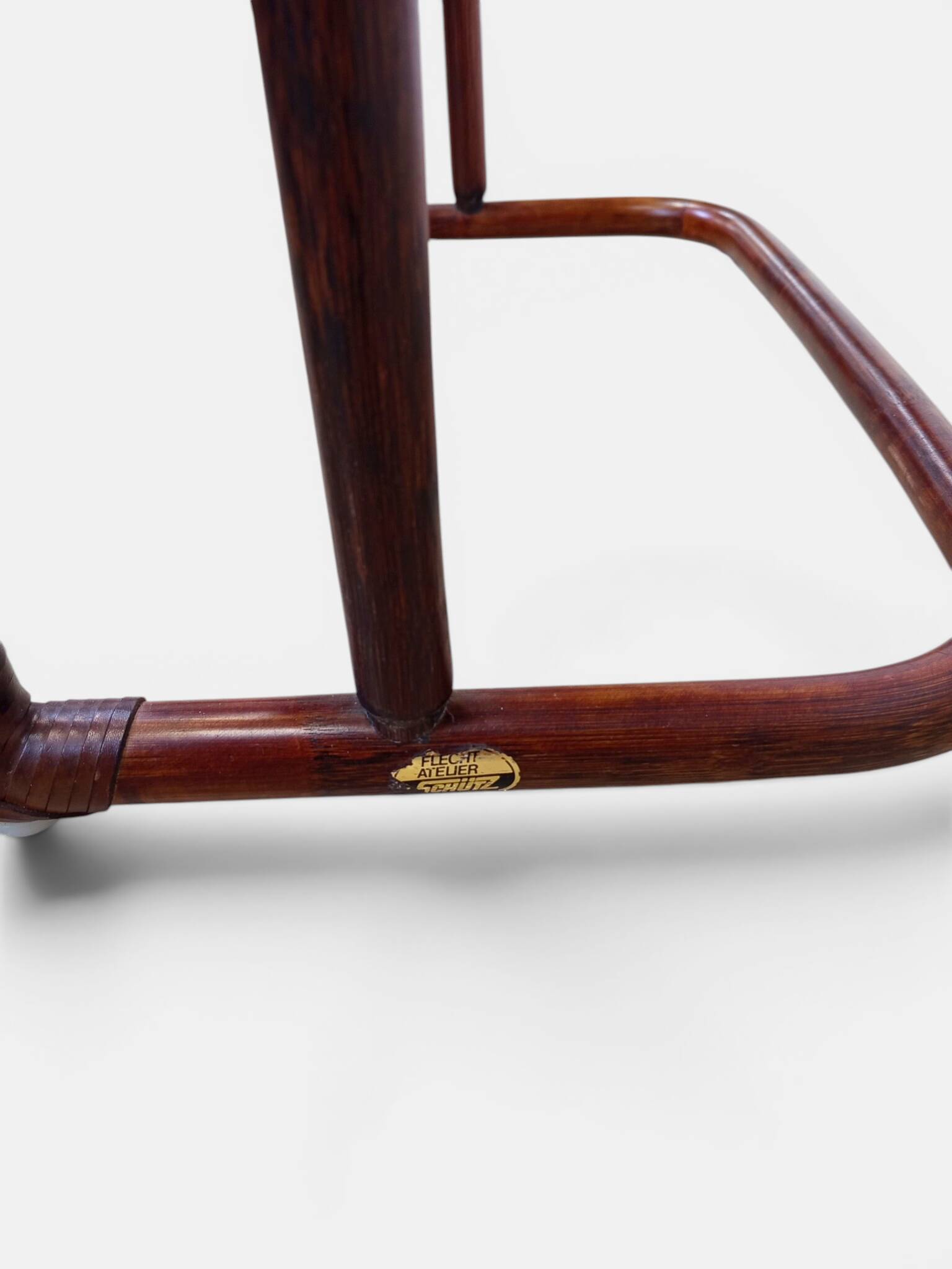 Vintage nesting tables in rattan and smoked glass by Flecht-Atelier Schütz.