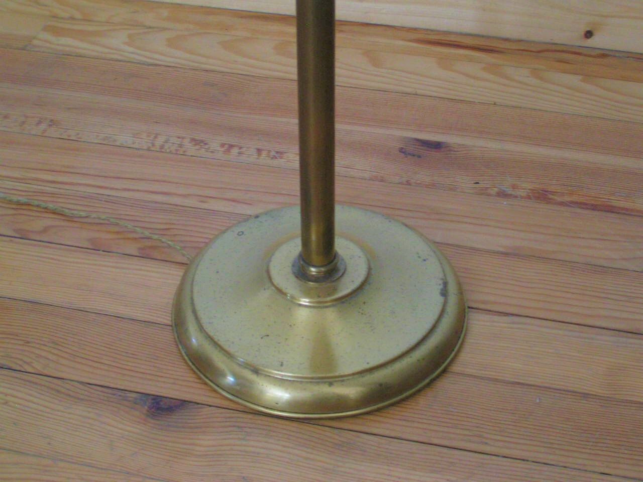 Articulated brass floor lamp