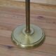Articulated brass floor lamp