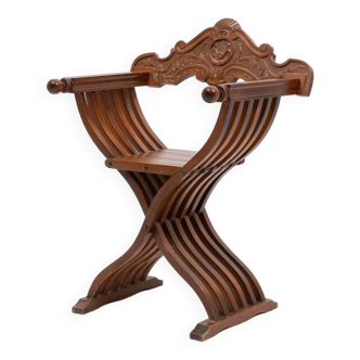 Carved Savonarola armchair, Italy 1960’s