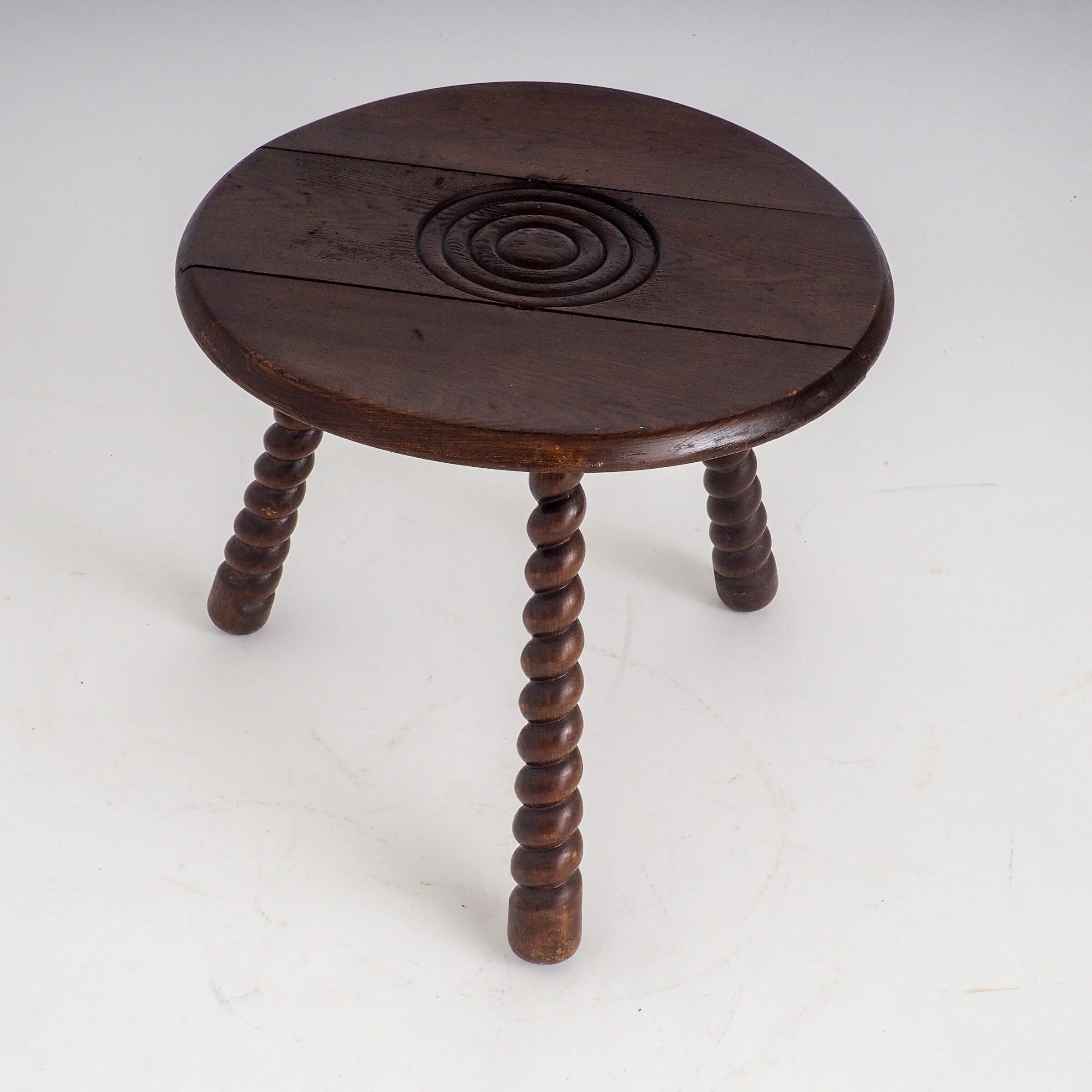 French oak tripod side table attributed to Charles Dudouyt