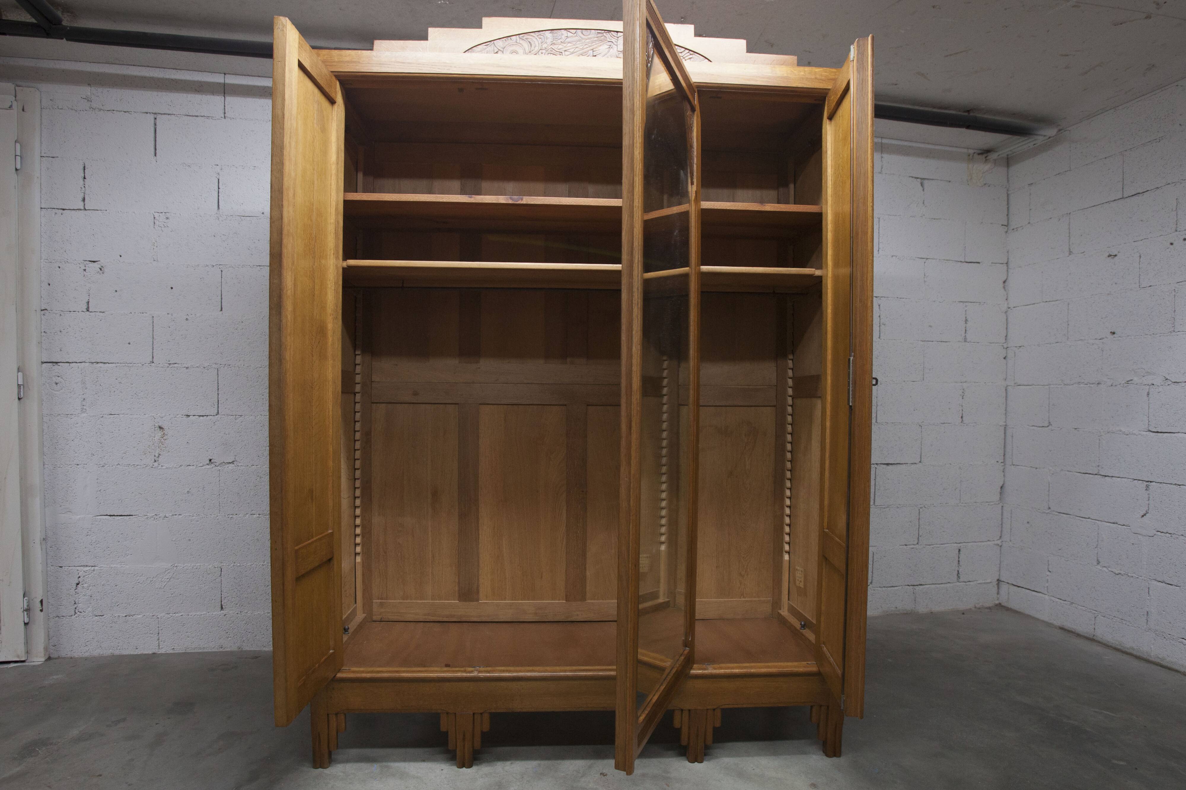 Art Deco carved oak wardrobe - Flemish workshop circa 1930