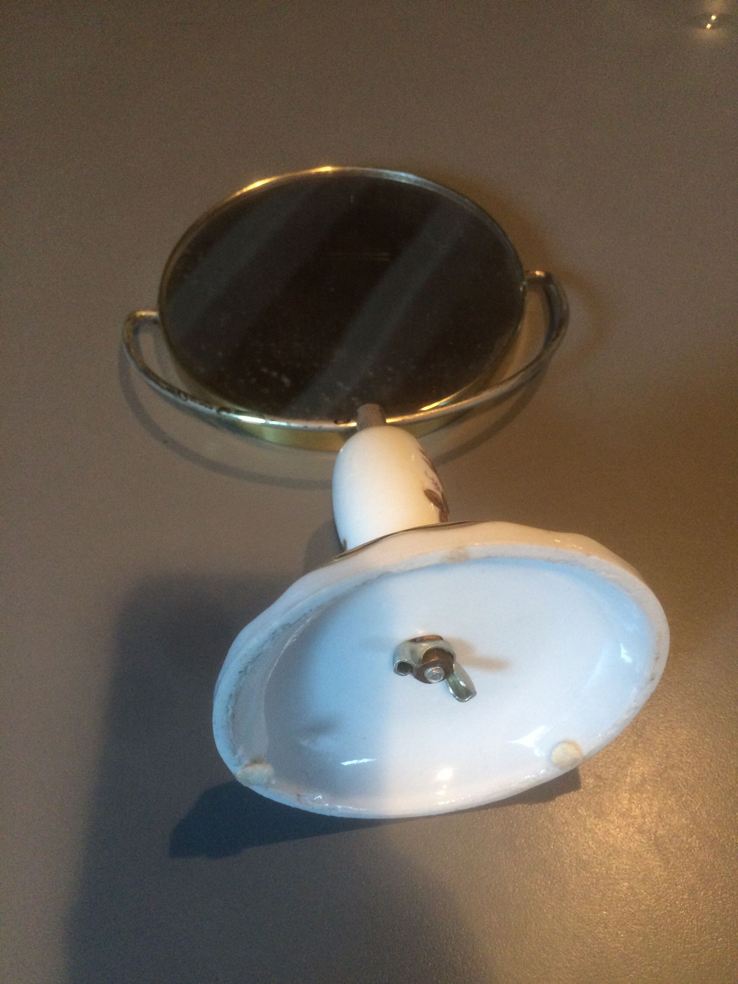Mirror swivelling with porcelain foot