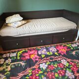 Bohemian floral design, handwoven wool rug, black background with colorful flowers