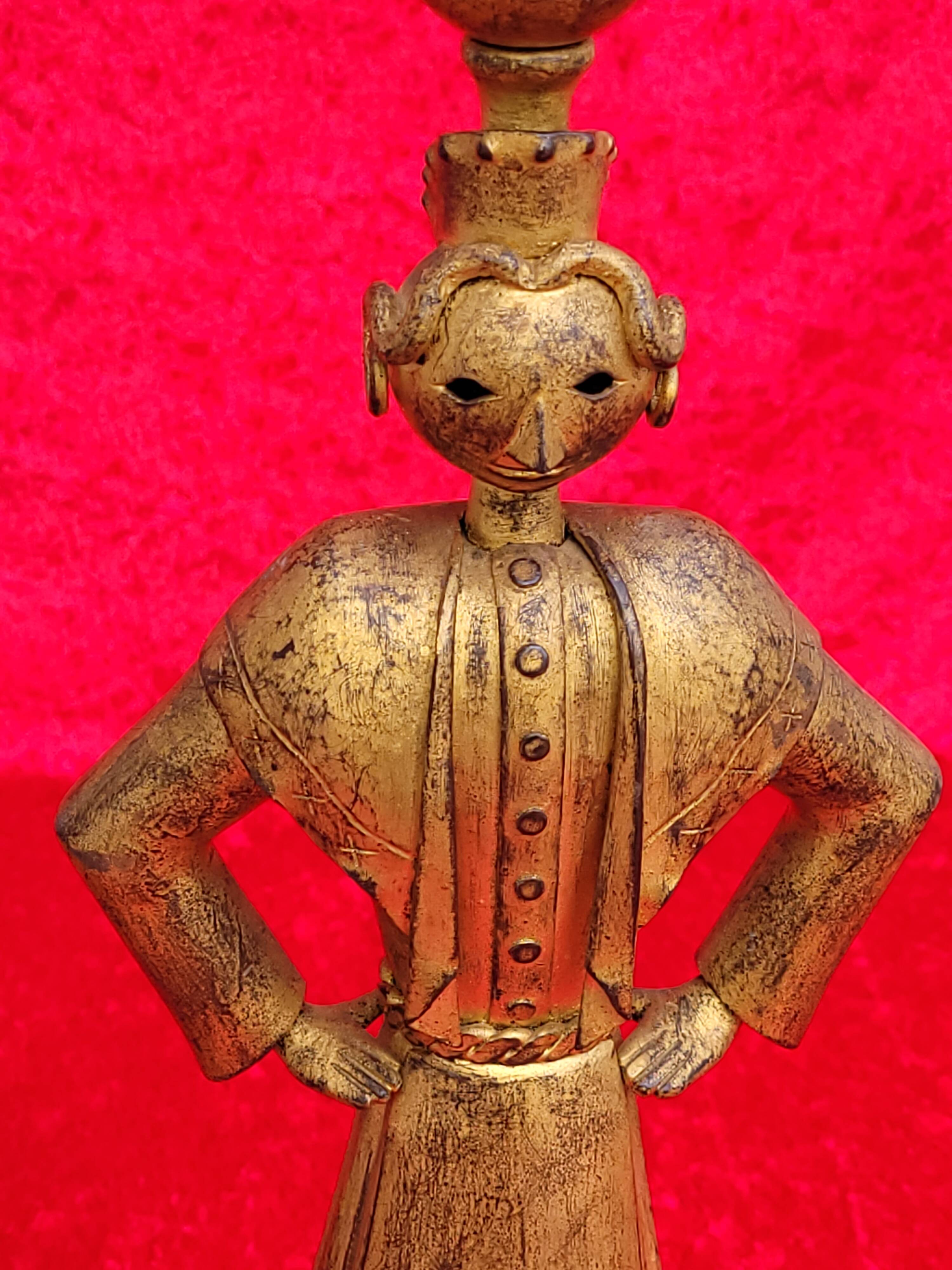 Pair of gilded beaten iron sculpture lamps attributed to Gilbert Poillerat