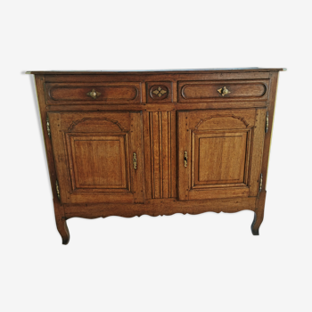 Old low buffet, 19th in rustic solid oak, carved and molded