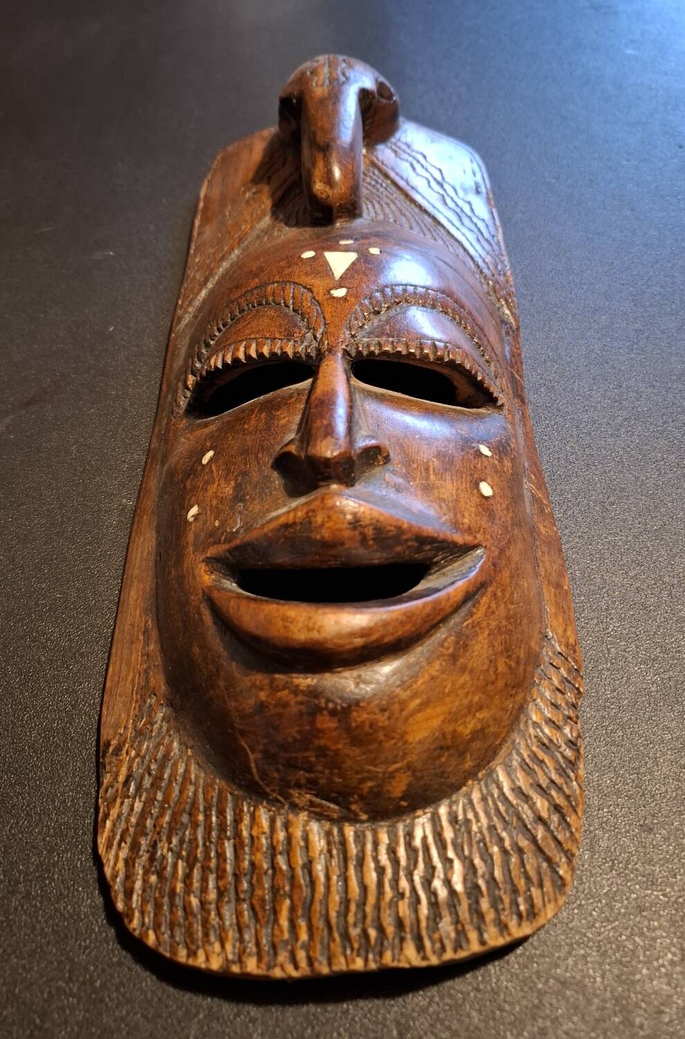 Ashanti tribal mask originating from Ghana.
