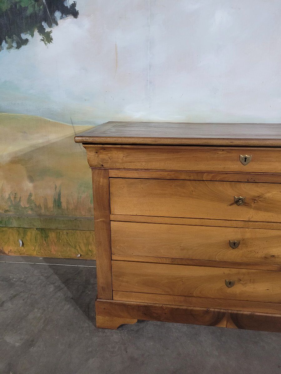 Louis Philippe period chest of drawers in solid walnut.