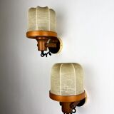 Pair of articulated "Cocoon" wall lights in resin and pine, Italy, circa 1970s