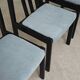 Set of 4 modernist black chairs with light blue ribbed fabric
