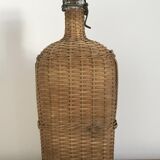 Glass bottle and wicker